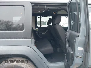 2014 Jeep Wrangler Unlimited Sport with VIN 1C4BJWDG4EL319259, listed as a IAAI auction lot 41494299 with 141,699 mi miles. Bid and sale history available at carsss.com. Image 8.