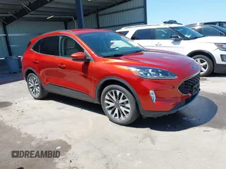 2020 Ford Escape Titanium Hybrid z VIN 1FMCU9DZXLUA84528, wystawiony jako IAAI lot #42591596 z przebiegiem 38 484 mil mil oraz . Historia ofert i sprzedaży dostępna na DreamBid. Obrazek 1.
