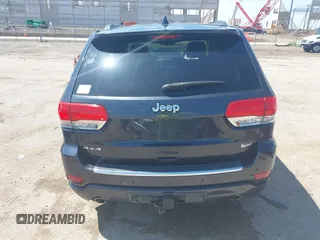 2015 Jeep Grand Cherokee High Altitude with VIN 1C4RJFCG5FC807394, listed as a IAAI auction lot 42452034 with 72,011 mi miles and . Bid and sale history available at DreamBid. Image 17.