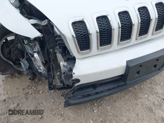2014 Jeep Cherokee Latitude with VIN 1C4PJMCSXEW150735, listed as a IAAI auction lot 42020944 with 76,303 mi miles and . Bid and sale history available at carsss.com. Image 18.