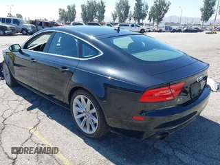 2013 Audi A7 Premium Plus with VIN WAUYGAFCXDN132677, listed as a IAAI auction lot 42630446 with 132,398 mi miles and . Bid and sale history available at DreamBid. Image 3.