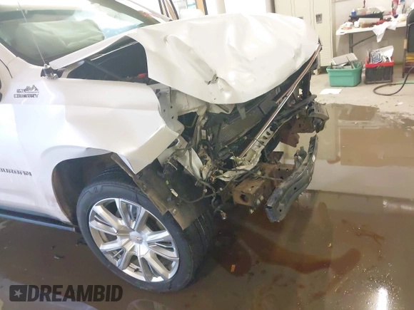 2022 Chevrolet Suburban High Country with VIN 1GNSKGKLXNR151036, listed as a IAAI auction lot 41549439 with 97,613 mi miles and . Bid and sale history available at DreamBid. Image 18.