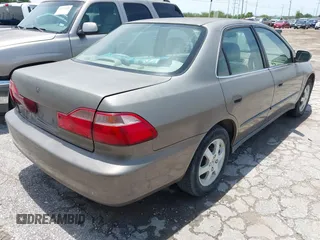 2000 Honda Accord SE z VIN 1HGCG5673YA090469, wystawiony jako IAAI lot #42391254 z przebiegiem 140 819 mil mil oraz . Historia ofert i sprzedaży dostępna na DreamBid. Obrazek 4.
