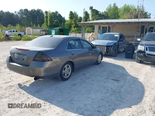 2006 Honda Accord EX-L z VIN 1HGCM56876A147156, wystawiony jako IAAI lot #42035408 z przebiegiem 386 761 mil mil oraz . Historia ofert i sprzedaży dostępna na DreamBid. Obrazek 4.