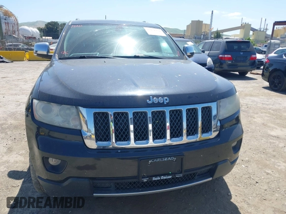 2013 Jeep Grand Cherokee Overland with VIN 1C4RJECT8DC534021, listed as a IAAI auction lot 42058374 with 137,289 mi miles. Bid and sale history available at carsss.com. Image 6.