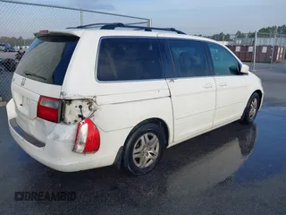2005 Honda Odyssey EX-L with VIN 5FNRL38625B412583, listed as a IAAI auction lot 41842636 with 376,600 mi miles. Bid and sale history available at carsss.com. Image 4.