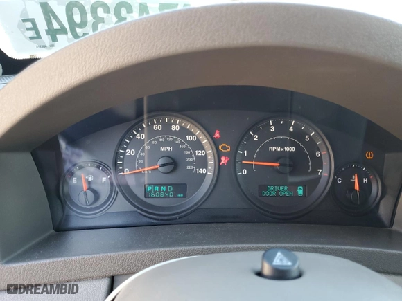 2005 Jeep Grand Cherokee Laredo with VIN 1J4HS48N05C566325, listed as a Copart auction lot 84743394 with 160,840 mi miles and Salvage Title. Bid and sale history available at carsss.com. Image 9.