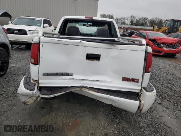 2001 GMC Sonoma SL with VIN 1GTCS145418119062, listed as a Copart auction lot 80579954 with 76,295 mi miles and Salvage Title. Bid and sale history available at carsss.com. Image 6.