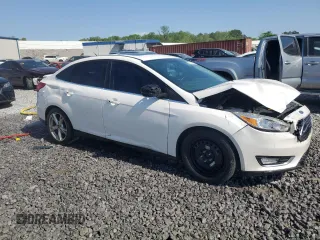 2016 Ford Focus Titanium z VIN 1FADP3J25GL201003, wystawiony jako Copart lot #53799745 z przebiegiem 194 055 mil mil oraz Szkoda całkowita • Salvage title. Historia ofert i sprzedaży dostępna na DreamBid. Obrazek 4.