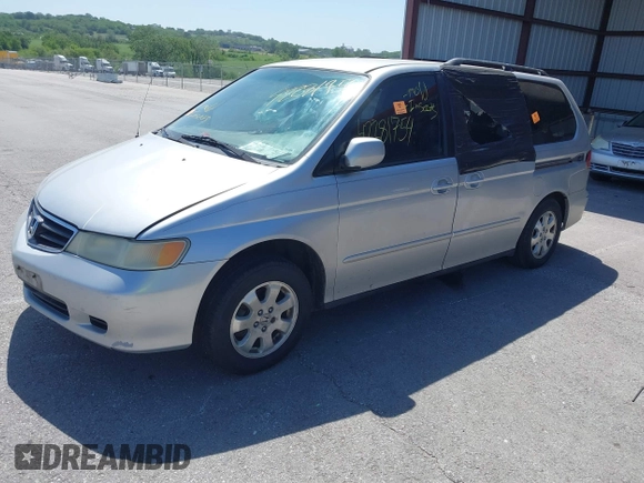 2004 Honda Odyssey EX-L with VIN 5FNRL18064B027350, listed as a IAAI auction lot 42281754 with Not provided miles and . Bid and sale history available at DreamBid. Image 2.