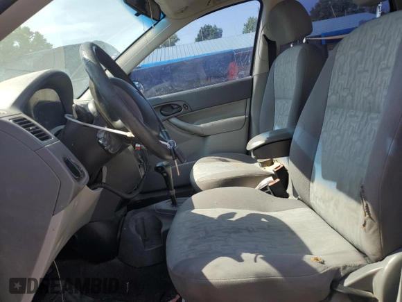2005 Ford Focus S with VIN 1FAFP34N95W247489, listed as a Copart auction lot 60858415 with Not provided miles and Salvage title. Bid and sale history available at DreamBid. Image 7.