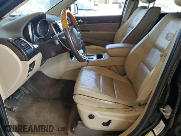 2013 Jeep Grand Cherokee Overland with VIN 1C4RJECT7DC526119, listed as a Copart auction lot 60735594 with 143,454 mi miles and Clean Title. Bid and sale history available at carsss.com. Image 7.