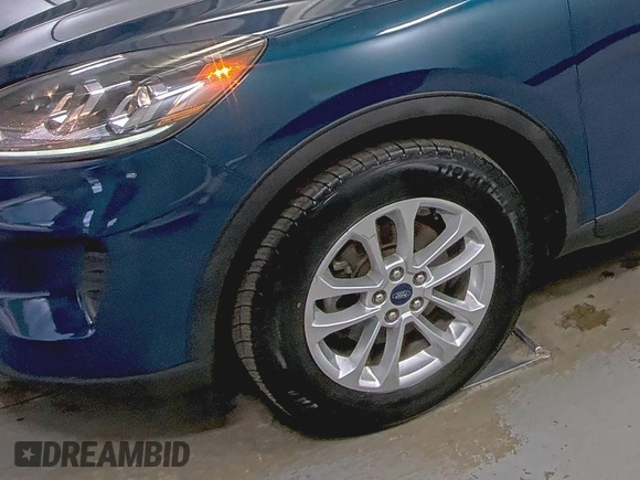 2020 Ford Escape SE with VIN 1FMCU9G65LUB80892, listed as a IAAI auction lot 42715723 with 86,362 mi miles and . Bid and sale history available at DreamBid. Image 28.