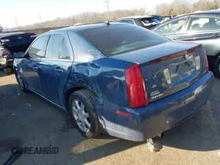 2009 Cadillac STS AWD w/1SB with VIN 1G6DD67VX90130281, listed as a IAAI auction lot 41384191 with 102,943 mi miles. Bid and sale history available at carsss.com. Image 3.
