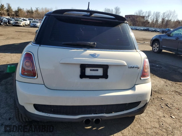 2007 MINI Hardtop S with VIN WMWMF73577TT86065, listed as a Copart auction lot 57262795 with 100,052 mi miles and Salvage Title. Bid and sale history available at DreamBid. Image 6.