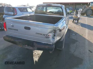2004 Dodge Dakota Sport with VIN 1D7HG38K34S561735, listed as a IAAI auction lot 41409622 with Not Provided miles and . Bid and sale history available at carsss.com. Image 4.