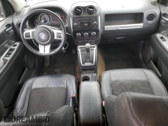 2016 Jeep Compass Latitude with VIN 1C4NJDEB6GD687332, listed as a Copart auction lot 44217275 with 131,952 mi miles and Salvage Title. Bid and sale history available at DreamBid. Image 8.
