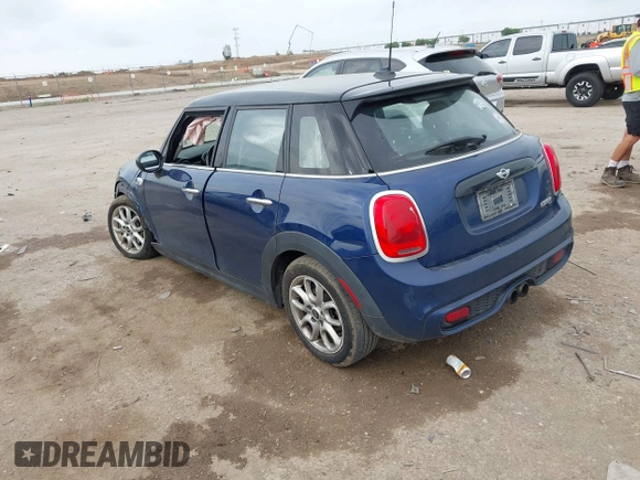 2017 MINI Hardtop 4 Door Cooper S z VIN WMWXU3C3XH2F49313, wystawiony jako IAAI lot #42137594 z przebiegiem 87 865 mil mil oraz . Historia ofert i sprzedaży dostępna na DreamBid. Obrazek 3.