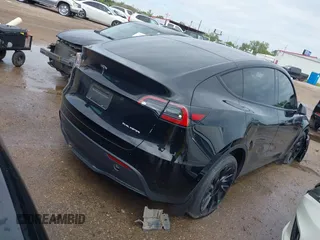 2023 Tesla Model Y Long Range with VIN 7SAYGDEE3PA024315, listed as a IAAI auction lot 41900788 with Not Provided miles. Bid and sale history available at carsss.com. Image 4.