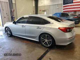 2022 Honda Civic Touring z VIN 2HGFE1F9XNH301080, wystawiony jako Copart lot #55320125 z przebiegiem 47 767 mil mil oraz Szkoda całkowita • Salvage title. Historia ofert i sprzedaży dostępna na DreamBid. Obrazek 2.