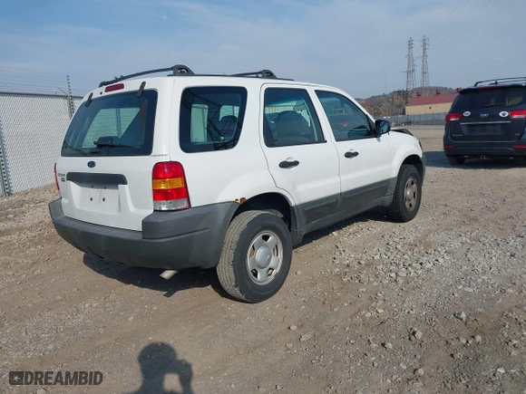 2003 Ford Escape XLS Popular with VIN 1FMYU92183KB46619, listed as a IAAI auction lot 40695244 with 0 mi miles. Bid and sale history available at carsss.com. Image 4.