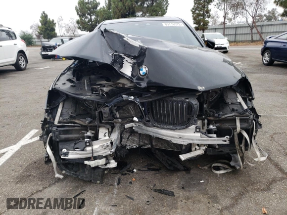 2018 BMW 7 Series 740i with VIN WBA7E2C56JG741911, listed as a Copart auction lot 63716373 with 45,059 mi miles. Bid and sale history available at carsss.com. Image 5.