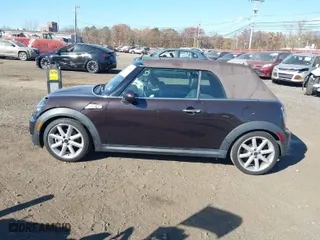 2013 MINI Cooper Convertible S with VIN WMWZP3C56DT705074, listed as a IAAI auction lot 40762024 with 57,685 mi miles. Bid and sale history available at carsss.com. Image 14.