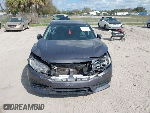 2017 Honda Civic LX with VIN 19XFC2F51HE036153, listed as a IAAI auction lot 41546498 with 78,726 mi miles and . Bid and sale history available at DreamBid. Image 12.