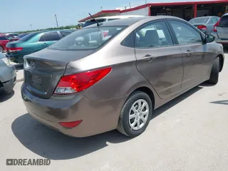 2013 Hyundai Accent GLS with VIN KMHCT4AE5DU359702, listed as a IAAI auction lot 42019779 with 113,162 mi miles. Bid and sale history available at carsss.com. Image 4.