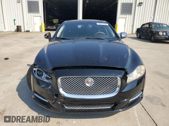 2015 Jaguar XJ with VIN SAJWA1CZ7F8V83167, listed as a Copart auction lot 74991144 with 94,502 mi miles and Salvage Title. Bid and sale history available at carsss.com. Image 5.