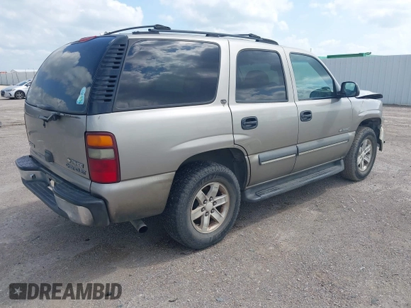 2002 Chevrolet Tahoe LS z VIN 1GNEC13V22R206341, wystawiony jako IAAI lot #42436560 z przebiegiem 271 904 mil mil oraz . Historia ofert i sprzedaży dostępna na DreamBid. Obrazek 4.