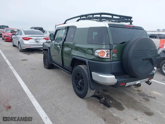 2010 Toyota FJ Cruiser with VIN JTEBU4BF6AK080671, listed as a IAAI auction lot 41193011 with 97,192 mi miles. Bid and sale history available at carsss.com. Image 3.