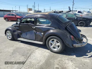 1963 Volkswagen Beetle with VIN 5020781, listed as a Copart auction lot 68491334 with 36,482 mi miles and Salvage Title. Bid and sale history available at DreamBid. Image 2.