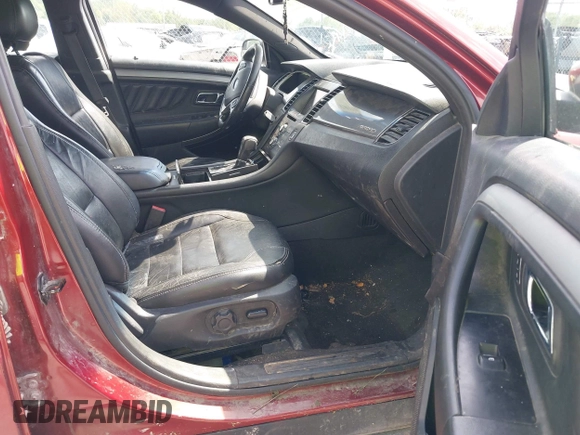 2014 Ford Taurus SEL z VIN 1FAHP2E82EG157445, wystawiony jako IAAI lot #42133676 z przebiegiem 174 616 mil mil oraz . Historia ofert i sprzedaży dostępna na DreamBid. Obrazek 5.