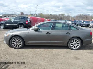 2013 Audi A6 Premium Plus z VIN WAUGGAFC1DN038375, wystawiony jako IAAI lot #42051929 z przebiegiem 118 181 mil mil oraz . Historia ofert i sprzedaży dostępna na DreamBid. Obrazek 14.