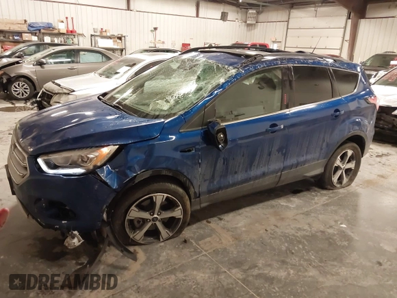 2017 Ford Escape SE z VIN 1FMCU9GD2HUB99955, wystawiony jako IAAI lot #41572200 z przebiegiem 63 023 mil mil oraz . Historia ofert i sprzedaży dostępna na DreamBid. Obrazek 17.