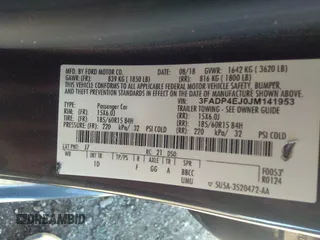 2018 Ford Fiesta SE with VIN 3FADP4EJ0JM141953, listed as a IAAI auction lot 38529613 with 74,502 mi miles and . Bid and sale history available at DreamBid. Image 9.