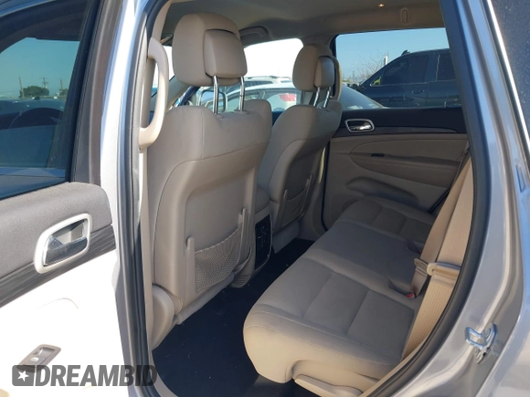 2021 Jeep Grand Cherokee Laredo E with VIN 1C4RJEAG6MC719089, listed as a IAAI auction lot 39290041 with 44,726 mi miles and . Bid and sale history available at DreamBid. Image 8.