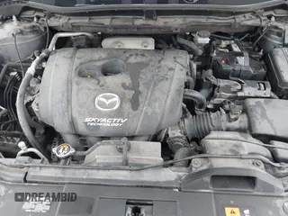 2015 Mazda CX-5 Grand Touring with VIN JM3KE4DY0F0479229, listed as a IAAI auction lot 41838381 with 139,843 mi miles. Bid and sale history available at carsss.com. Image 10.