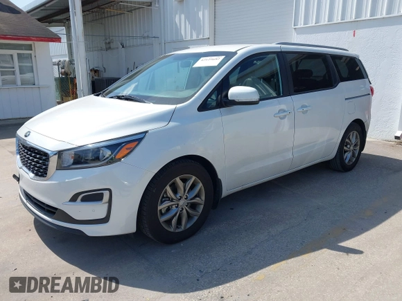 2021 Kia Sedona LX with VIN KNDMB5C12M6661917, listed as a IAAI auction lot 42129682 with 80,321 mi miles and . Bid and sale history available at carsss.com. Image 17.