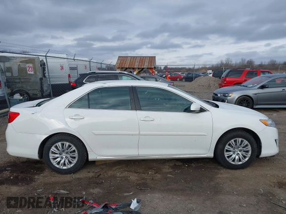 2014 Toyota Camry L with VIN 4T4BF1FKXER374901, listed as a IAAI auction lot 41861839 with 130,990 mi miles and . Bid and sale history available at DreamBid. Image 13.