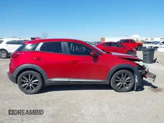 2016 Mazda CX-3 Grand Touring with VIN JM1DKBD71G0112329, listed as a IAAI auction lot 41662610 with 145,329 mi miles. Bid and sale history available at carsss.com. Image 13.