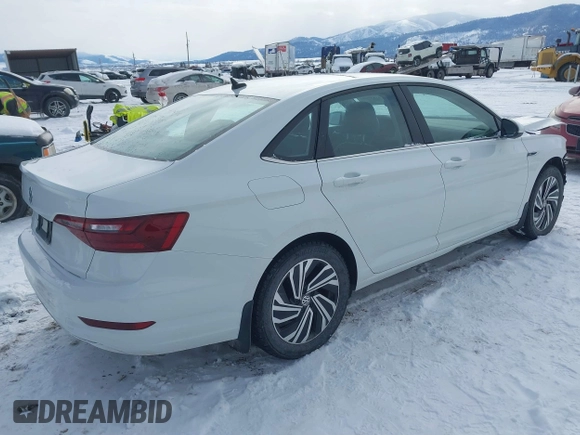 2021 Volkswagen Jetta SEL с VIN 3VWE57BU2MM051239, выставлен на аукционе IAAI как лот 41539604 с пробегом 63 017 миль миль и . История ставок и продаж доступна на DreamBid. Изображение 4.