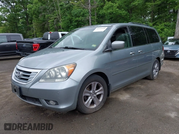 2008 Honda Odyssey Touring with VIN 5FNRL38908B066127, listed as a IAAI auction lot 42219444 with 188,868 mi miles and . Bid and sale history available at DreamBid. Image 2.