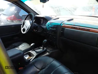 1999 Jeep Grand Cherokee Laredo with VIN 1J4GW58S0XC678864, listed as a IAAI auction lot 37593033 with Not provided miles and . Bid and sale history available at DreamBid. Image 5.