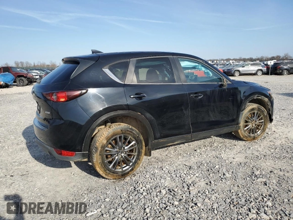 2019 Mazda CX-5 Touring with VIN JM3KFACM6K1562646, listed as a Copart auction lot 44153425 with 49,780 mi miles and Salvage Title. Bid and sale history available at carsss.com. Image 3.