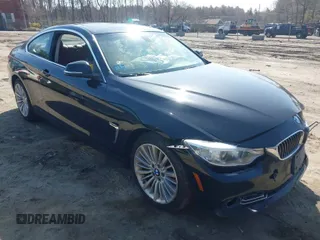 2014 BMW 4 Series 428i xDrive with VIN WBA3N9C54EF721093, listed as a IAAI auction lot 41902455 with 150,990 mi miles and . Bid and sale history available at carsss.com. Image 1.