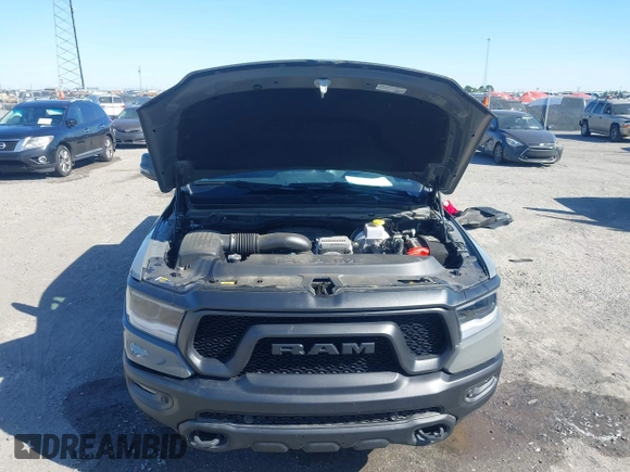 2023 Ram 1500 Rebel with VIN 1C6SRFLT2PN677577, listed as a IAAI auction lot 41991668 with 20,507 mi miles and . Bid and sale history available at DreamBid. Image 10.