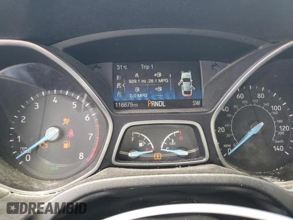 2018 Ford Focus SE z VIN 1FADP3F25JL272797, wystawiony jako Copart lot #54626215 z przebiegiem 116 679 mil mil oraz Szkoda całkowita • Salvage title. Historia ofert i sprzedaży dostępna na DreamBid. Obrazek 9.