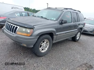 2002 Jeep Grand Cherokee with VIN 1J4GW38N62C190851, listed as a IAAI auction lot 42519384 with 142,066 mi miles and . Bid and sale history available at DreamBid. Image 2.